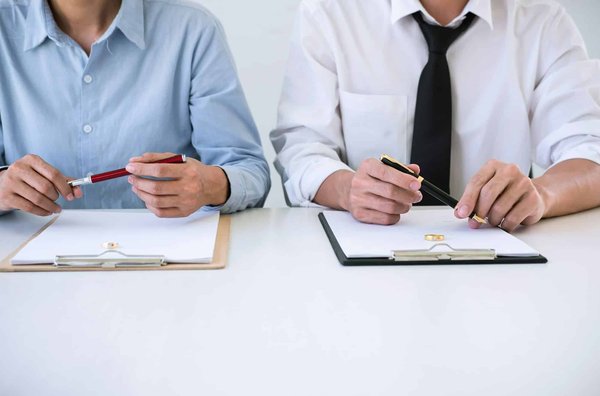 What are the specific legal steps for dissolving a charity in the UK?